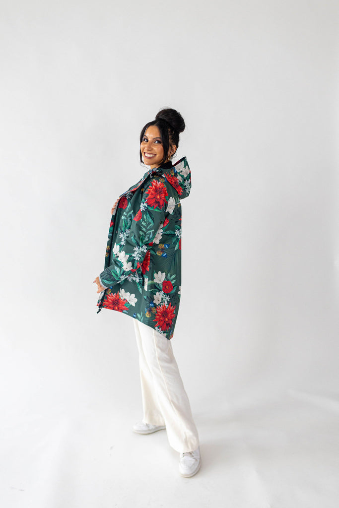 Jardin Scribbler mesh-lined rain jacket, green botanical floral print, raincoat, colourful printed hooded rain wear, waterproof jacket for women, lightweight, plus size raincoat, New Zealand design, PFA free, recycled plastic fabrics.