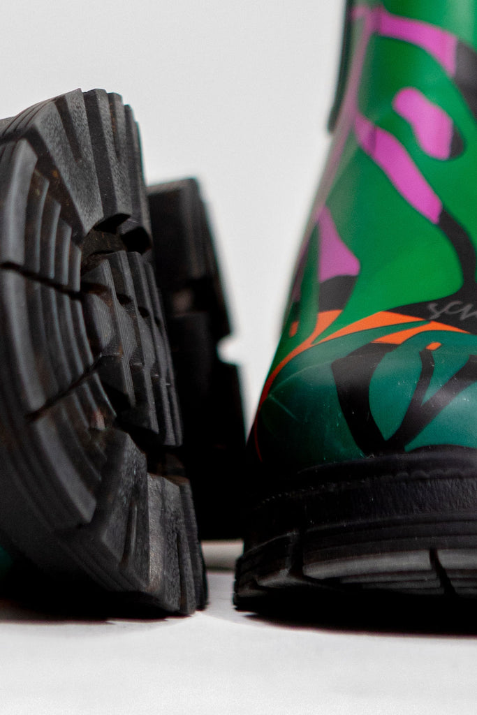 Scribbler rain boots, waterproof ankle gumboots for women, rain wellies for ladies, outerwear, waterproof, natural rubber boots, lightweight, neoprene lining, sustainable fashion, winter boots, tropical Carnaval printed Chelsea boots, carnival print, camping boots, stylish boots, colourful printed boots, best ankle gum boots, NZ design, New Zealand designer, handmade, high grip tread boots