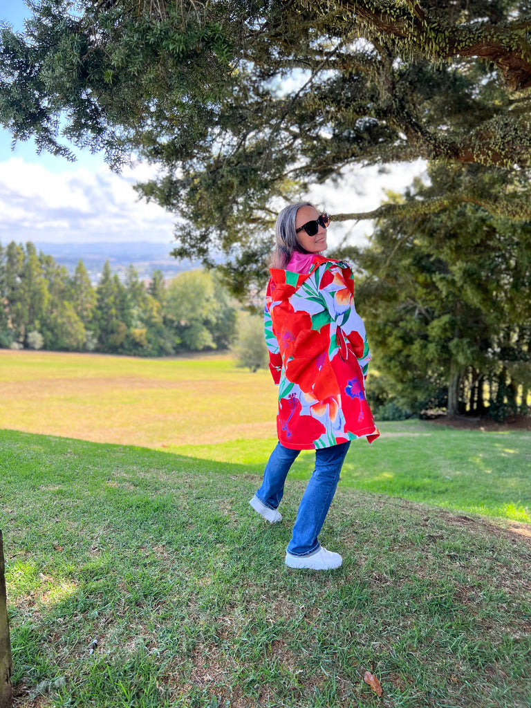 St Tropez Scribbler mesh-lined rain jacket, tropical, floral print, hibiscus flower, raincoat, colourful printed rain wear, waterproof jacket for women, lightweight, plus size raincoat, New Zealand design