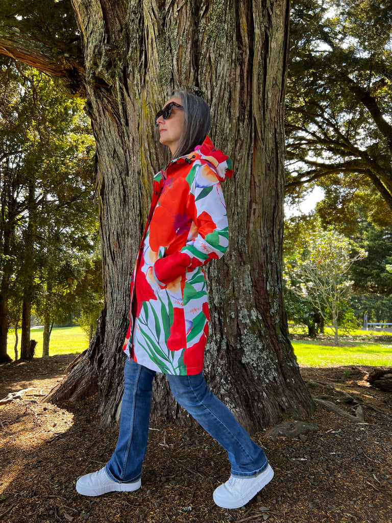 St Tropez Scribbler mesh-lined rain jacket, tropical, floral print, hibiscus flower, raincoat, colourful printed rain wear, waterproof jacket for women, lightweight, plus size raincoat, New Zealand design