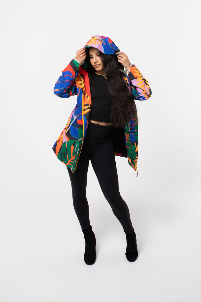 Carnaval fleece bonded womens waterproof raincoat, yellow, mustard, cobalt blue, magenta pink, plus size, NZ design, rain jacket, waterproof parka, winter coat, travel, wind proof, Scribbler, floral coat, USA winter coat, Canada waterproof winter parka, carinval print, colourful rain jacket, colourful raincoat, colourful coat