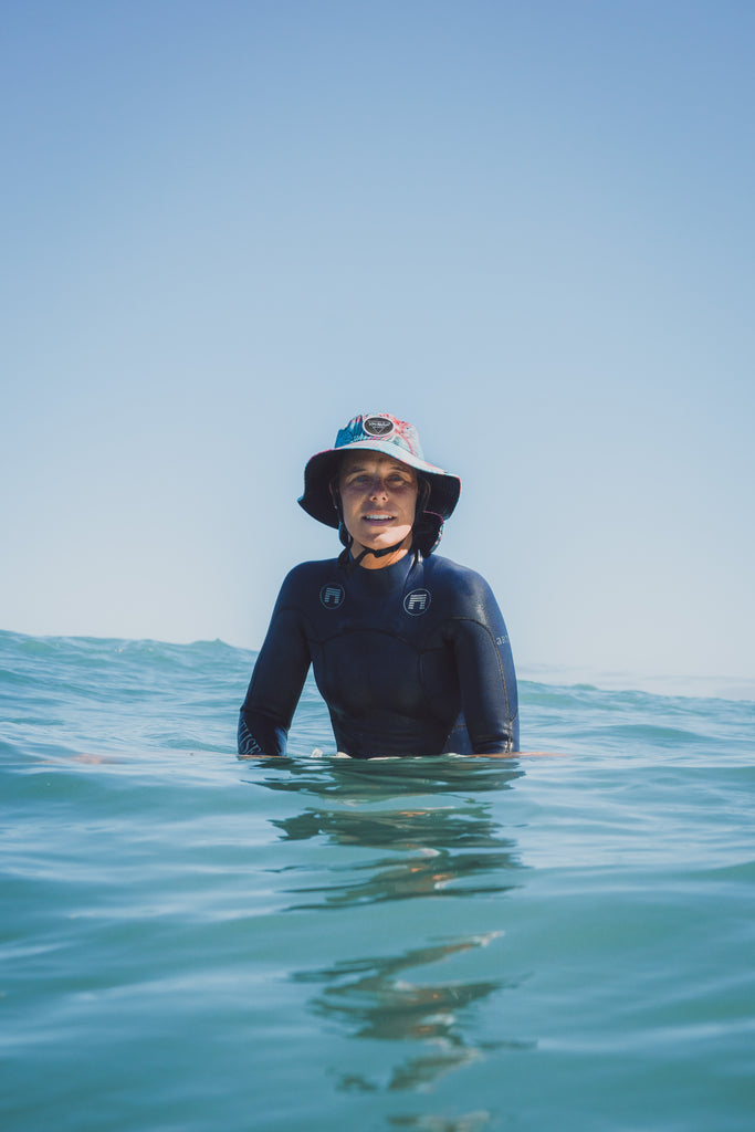 Surf hat for women, floral sun hat, water sports hat for ladies, colourful sports cap, Scribbler hat, surfing, kayaking, head wear, SUP, body boarding, sailing, fishing, sun protection, slap on a hat, sun smart, sun safe, New Zealand, kiwi, NZ, Paige Hareb