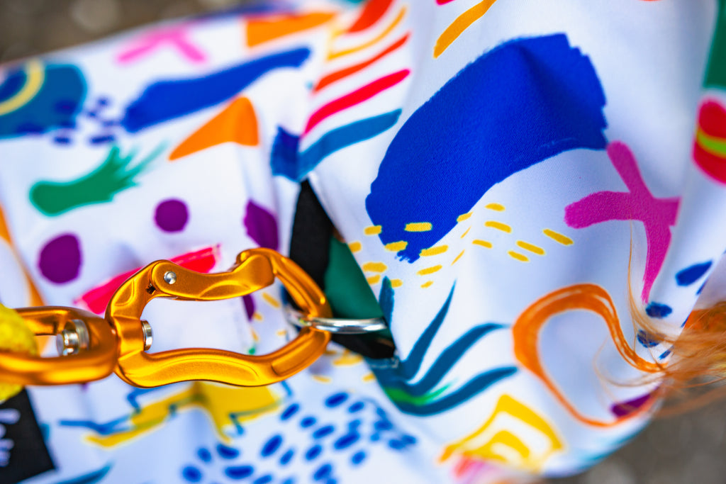 Scribbler pets, waterproof raincoat for dogs, rain jacket for dog, outerwear for dogs, waterproof, seam sealed, recycled plastic, abstract print, colourful, printed rainwear for pets, lightweight, collar access, harness access, sustainable