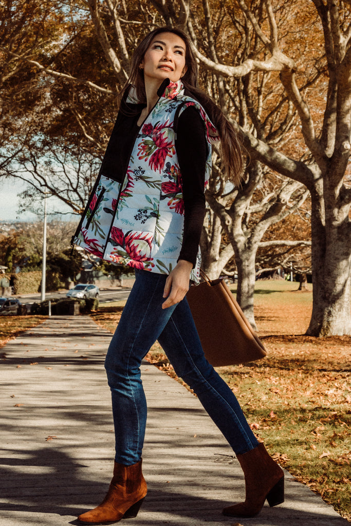 Scribbler protea vest, African protea print, White puffer vest, waterproof gilet, recycled fabric, recycled puffer, conscious fashion, plus size vest, floral vest, removable hood, botanical print, quilted vest, plus size vest, NZ, New Zealand, Australia, USA