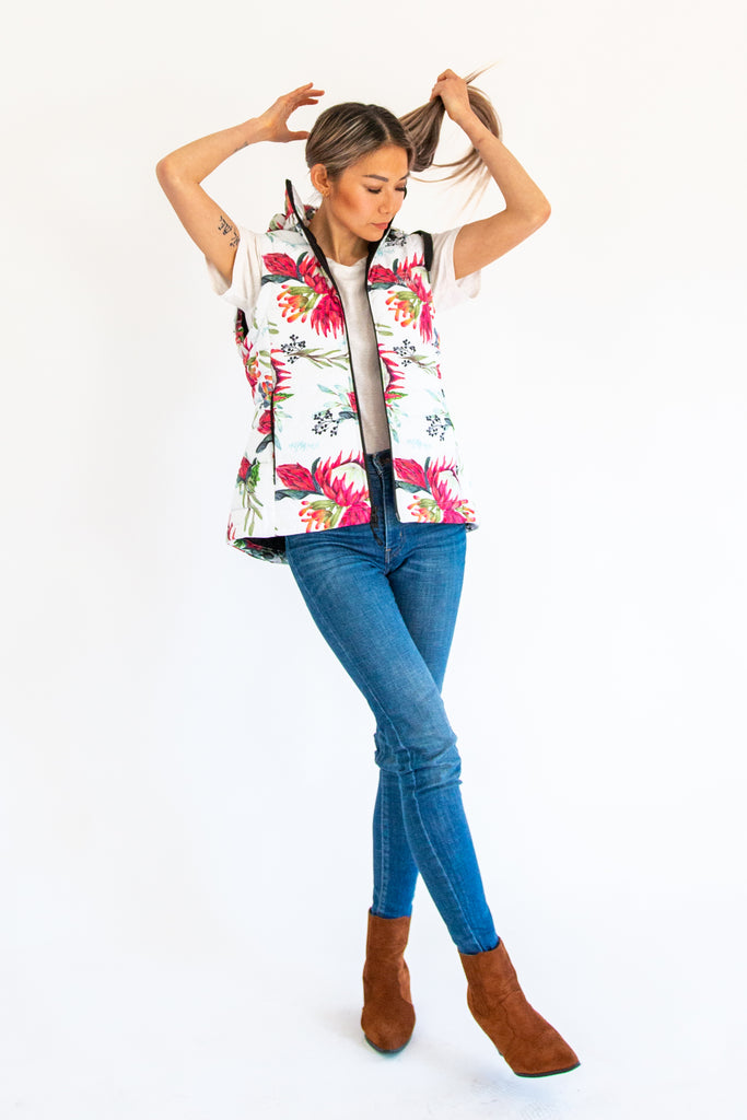 Scribbler protea vest, African protea print, White puffer vest, waterproof gilet, recycled fabric, recycled puffer, conscious fashion, plus size vest, floral vest, removable hood, botanical print, quilted vest, plus size vest, NZ, New Zealand, Australia, USA