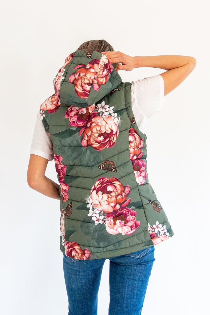 Scribbler waterproof puffer vest, Military Peony print, green puffer vest, waterproof gilet, recycled fabric, recycled puffer, conscious fashion, plus size vest, floral vest, removable hood, botanical print, printed vest, colourful vest, quilted vest, plus size vest, plus size, sustainable fashion, slow fashion, NZ, New Zealand, Australia, USA