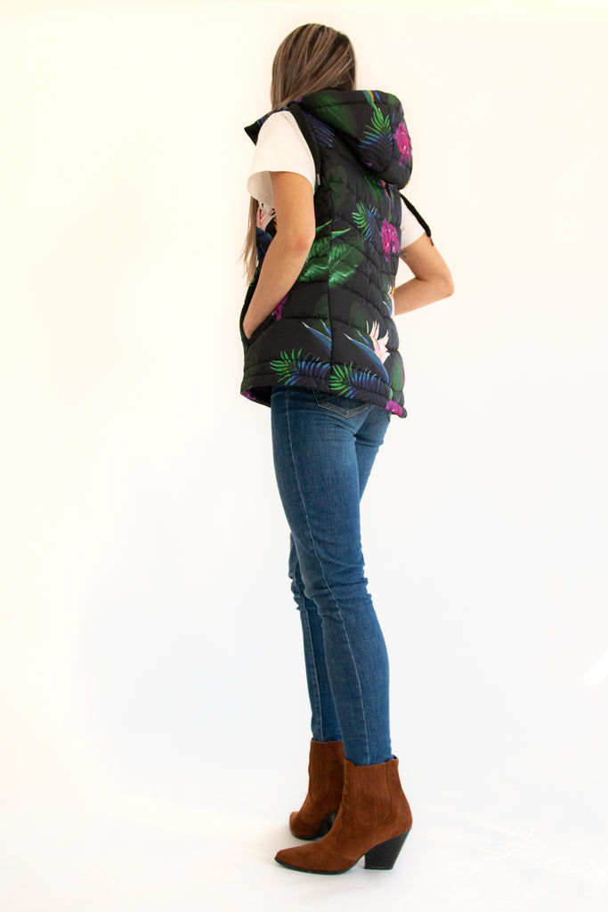 Scribbler paradiso vest, tropical print, black colourful puffer vest, waterproof gilet, recycled fabric, recycled puffer, conscious fashion, plus size vest, floral vest, removable hood, tropical print, printed vest, colourful vest, black puffer vest, quilted vest, plus size vest, NZ, New Zealand, Australia, USA