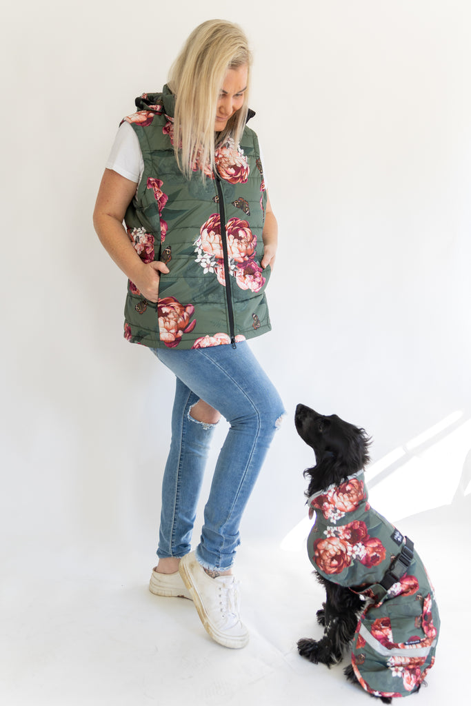 Scribbler waterproof puffer vest, Military Peony print, green puffer vest, waterproof gilet, recycled fabric, recycled puffer, conscious fashion, plus size vest, floral vest, removable hood, botanical print, printed vest, colourful vest, pet coat, dog rain coat, matching with pet, quilted vest, plus size vest, plus size
